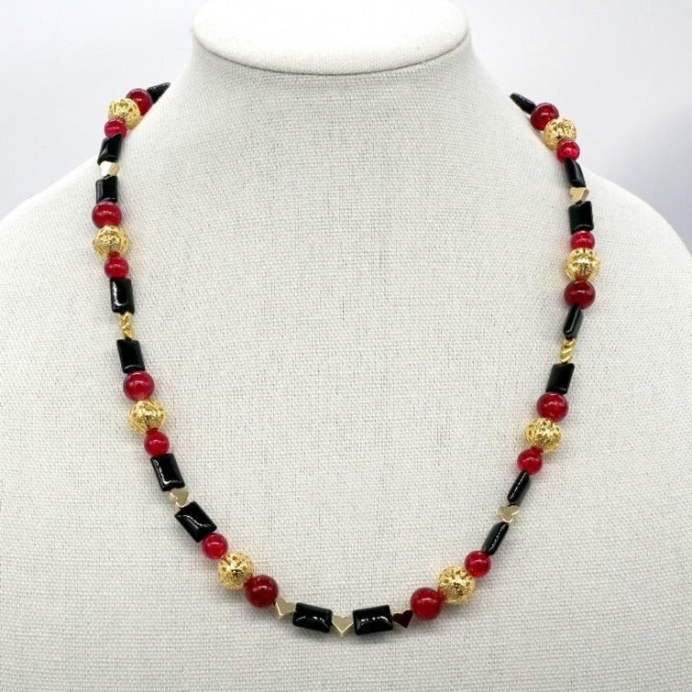 Necklace with black Onyx and red beads with heart accents.